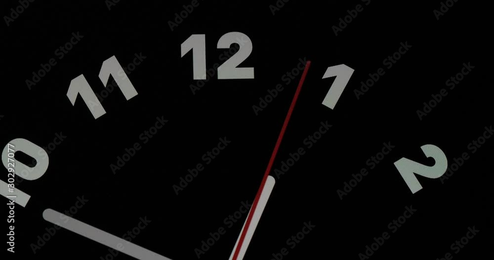 Timelapse or time lapse of clock on black background and movement of