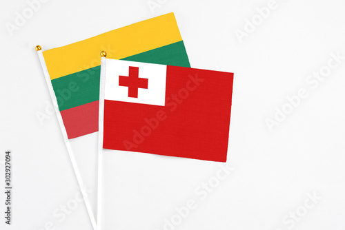 Tonga and Lithuania stick flags on white background. High quality fabric, miniature national flag. Peaceful global concept.White floor for copy space. Free Download Tonga and Lithuania stick flags on white background. High quality fabric, miniature national flag. Peaceful global concept.White floor for copy space. - GFXLoad