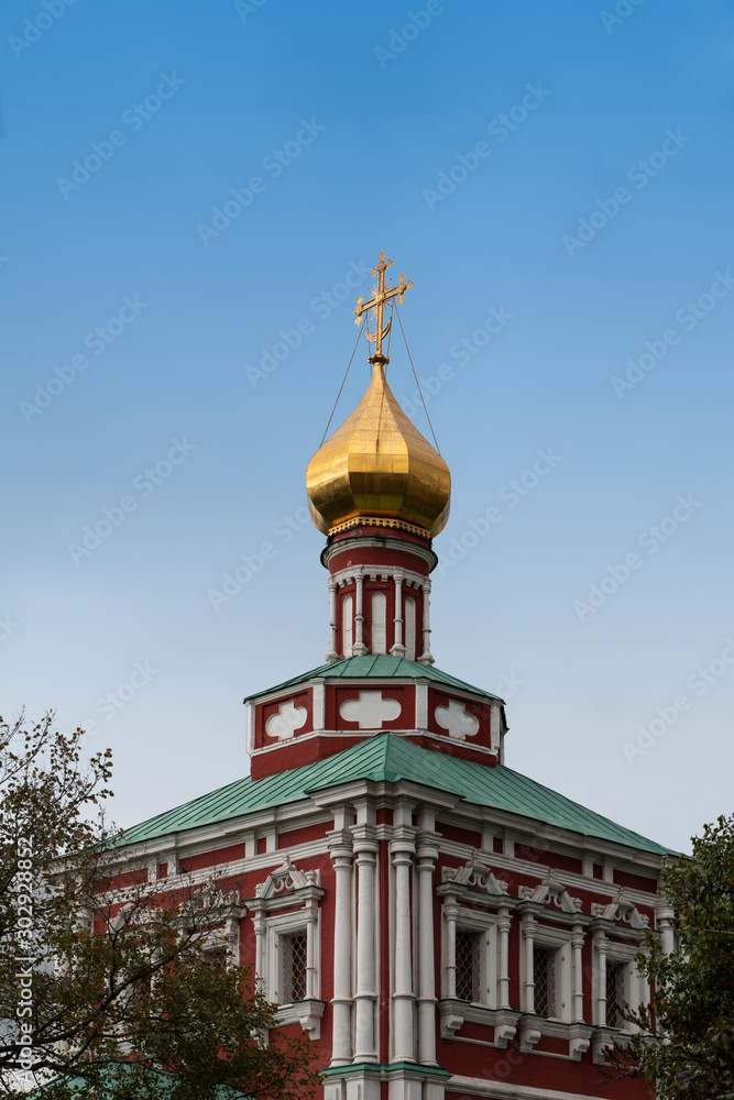 Obraz premium Golden Tower on a Church