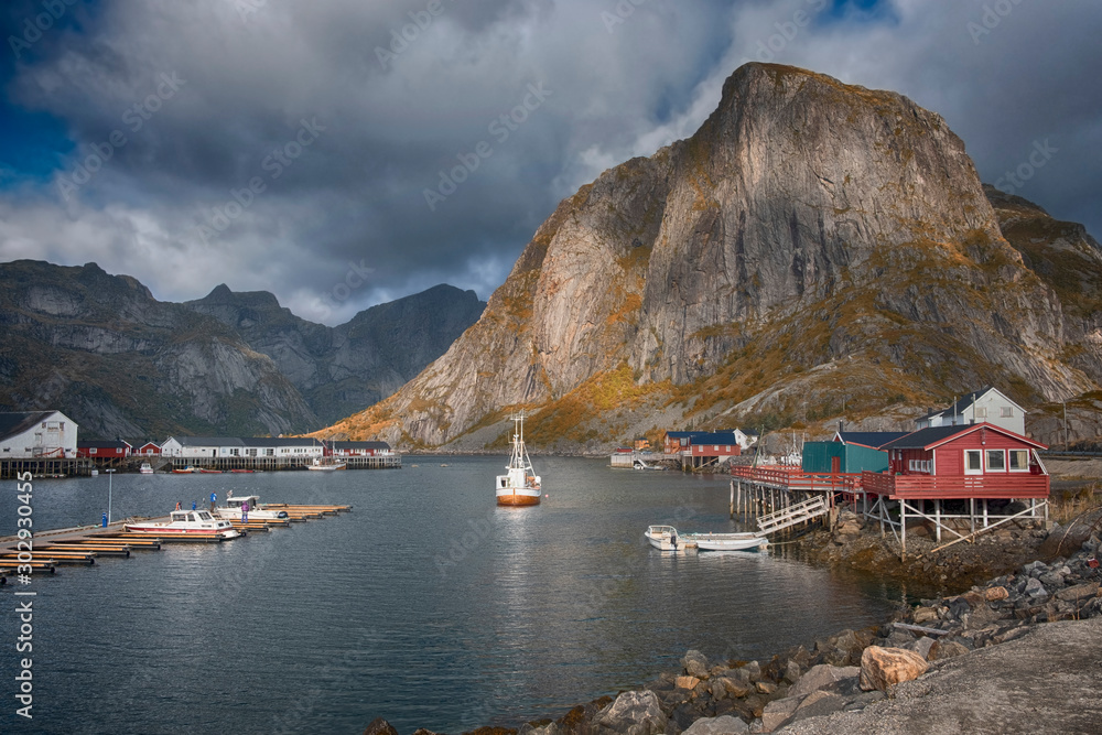  Reine city Lofoten Norway, Fishing  boats in the marina at the town on a sunny autumn day