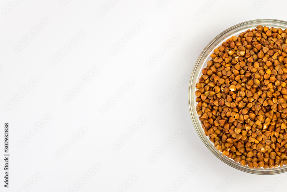 Buckwheat groats in a plate on a white background. Buckwheat porridge in a small plate. Diet breakfast. Healthy food. Buckwheat groats in a plate on a white background. Buckwheat porridge in a small plate. Diet breakfast. Healthy food.
