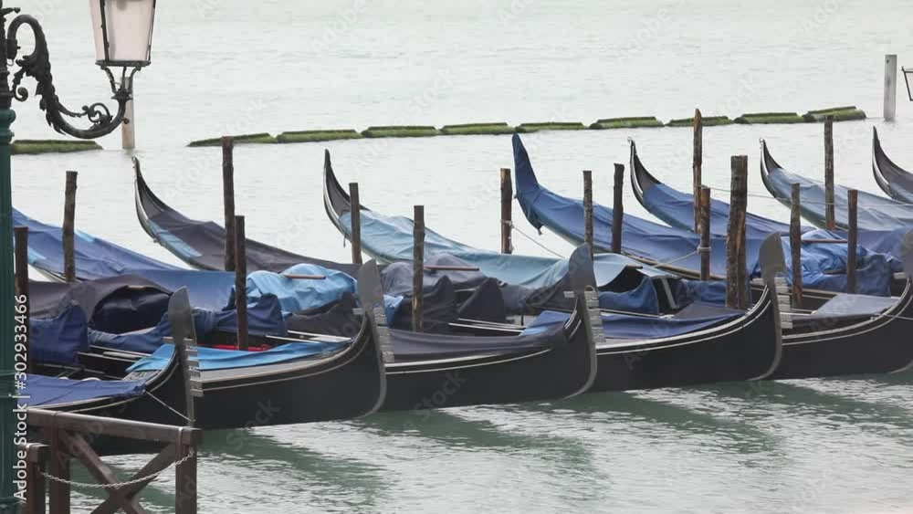 Gondolas are the typical boats in Venice in Italy Gondolas are the typical boats in Venice in Italy
