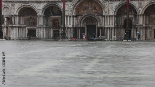 Basilica of Saint Mark in Main Square of Venice Island in Italy with high tide 