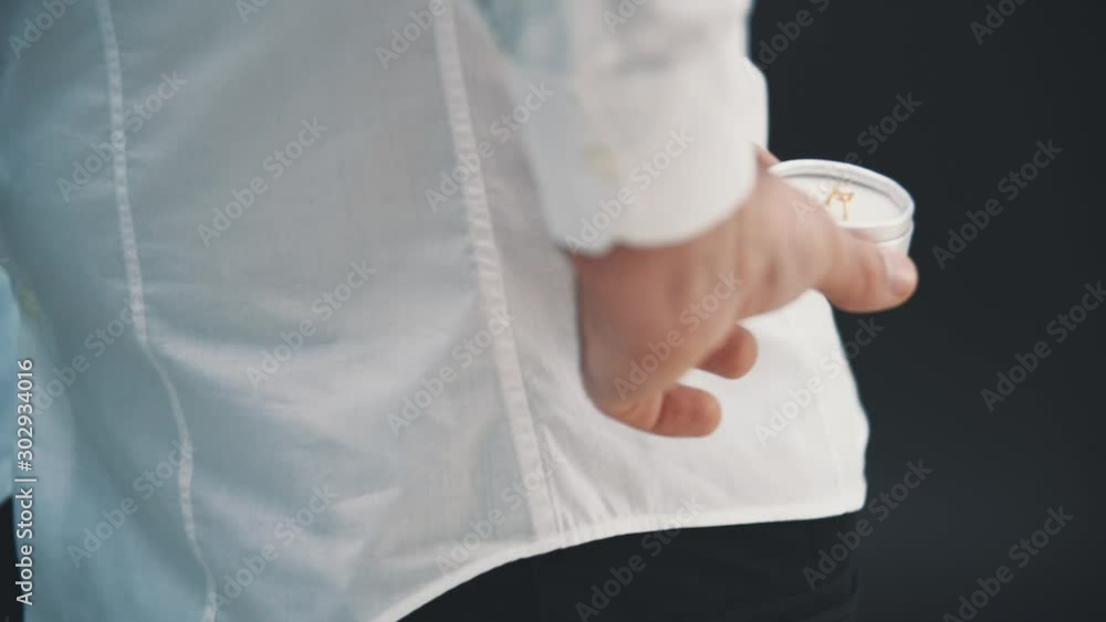 Cropped hand of man is standing on one knee with ring and roses, making proposal his woman. Cropped hand of man is standing on one knee with ring and roses, making proposal his woman.