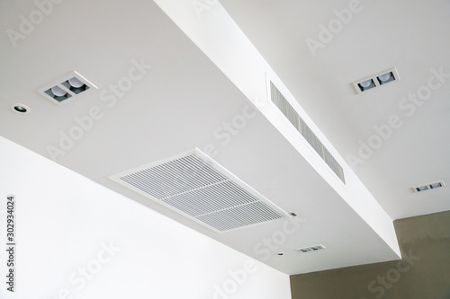 Ceiling mounted cassette type air conditioner.