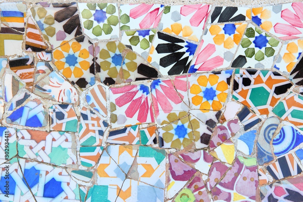 Mosaics by Gaudi in Park Guell in Barcelona, Spain. - obrazy, fototapety, plakaty 