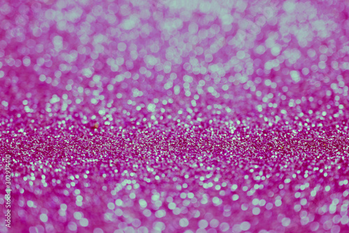 abstract blur or defocused lights bokeh pink glitter background select focus