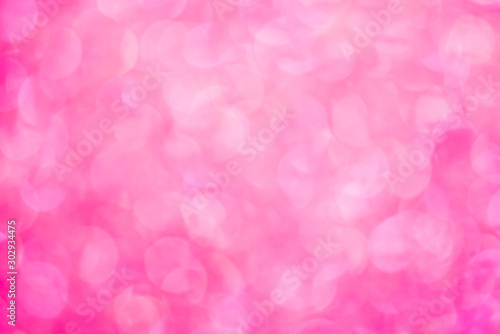 abstract blur or defocused lights bokeh on pink background