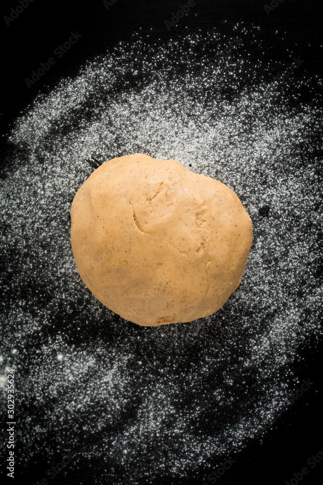 Dough on Wooden Background