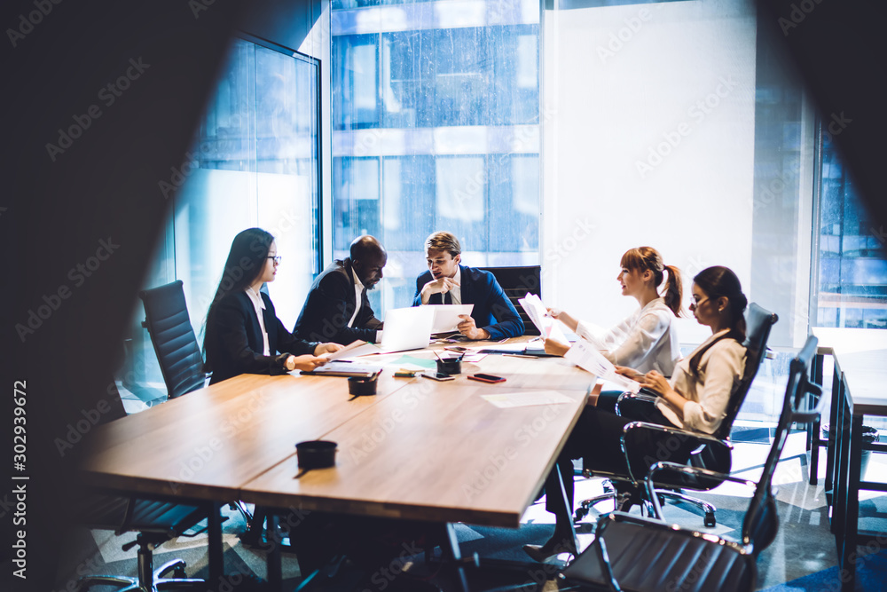 Cooperating diverse people in office Cooperating diverse people in office