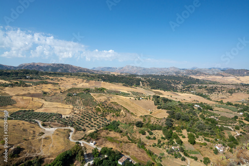 Scenic viewpoint to valley and mountains from Ronda  small ancient white town in Andalusia  Spain