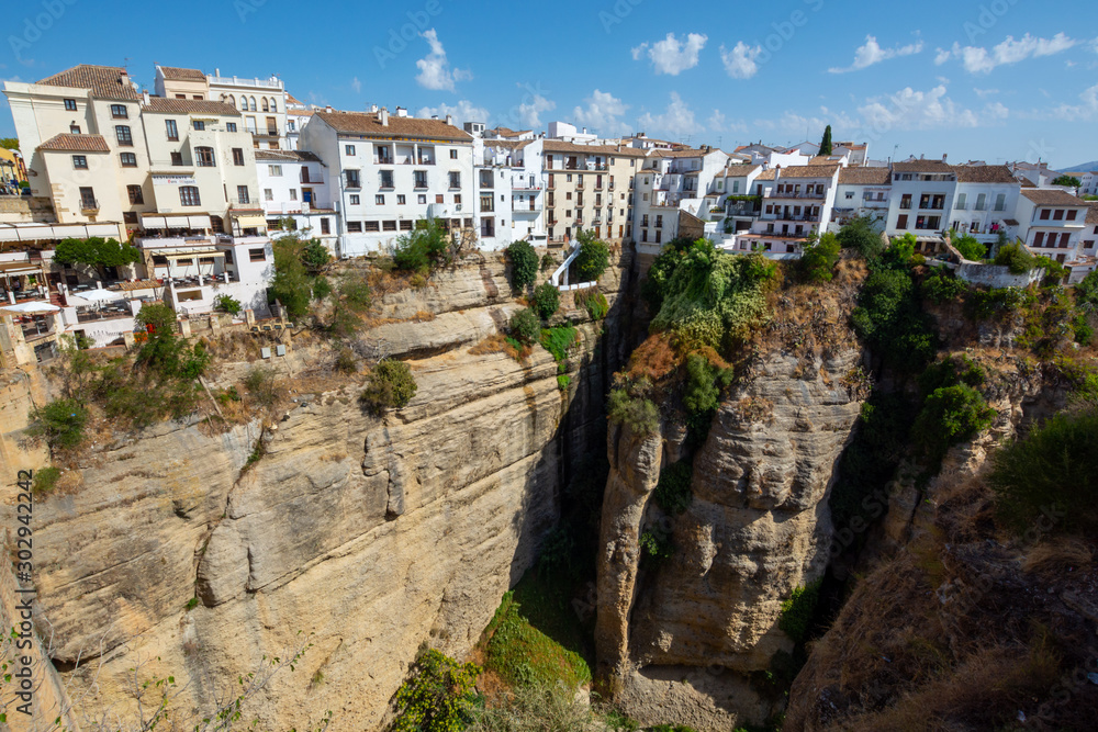Scenic viewpoint to canyon, valley and mountains from Ronda, small ancient white town in Andalusia, Spain