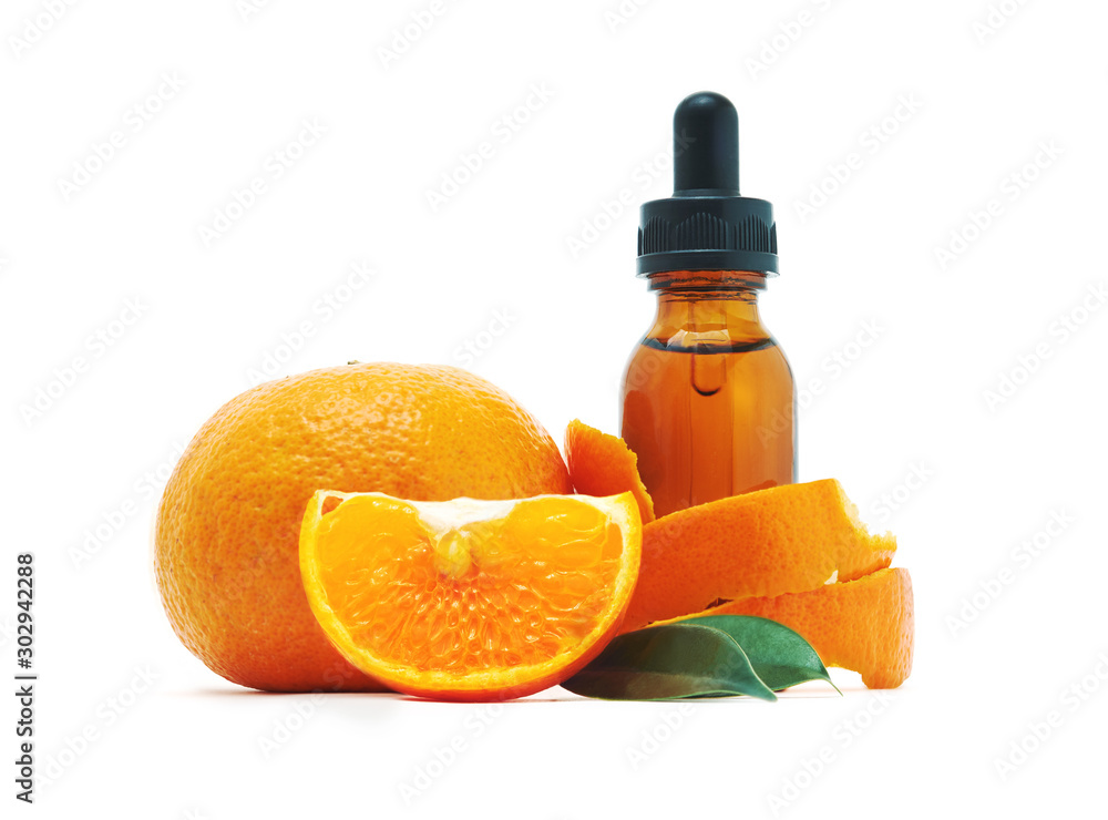 Serum extracted from oranges in glass bottles and oranges on white background Serum extracted from oranges in glass bottles and oranges on white background