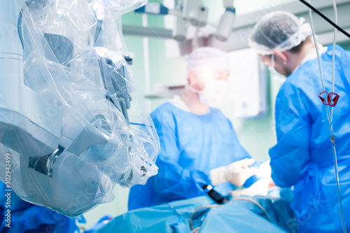 Medical robot. Robotic surgery. A medical operation by surgeons involving a robot. Modern technology, with the da Vinci surgical system. Sharpness on the instruments. Surgery oncology operation