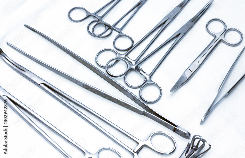 Emergency, ambulance and healthcare concept. Medical surgical instrument isolated on white background close-up top view Emergency, ambulance and healthcare concept. Medical surgical instrument isolated on white background close-up top view