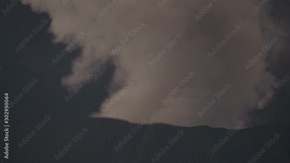 Bromo volcano eruption at sunrise close-up, Java, Indonesia Bromo volcano eruption at sunrise close-up, Java, Indonesia