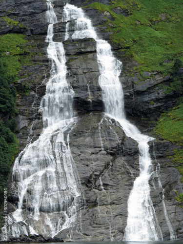 The Suitor waterfall is shaped like a bottle and is located opposite the Seven Sisters waterfalls on the Geirangerfjord. You pass by if you take a ferry from Geiranger to Hellesylt  Norway  Europe