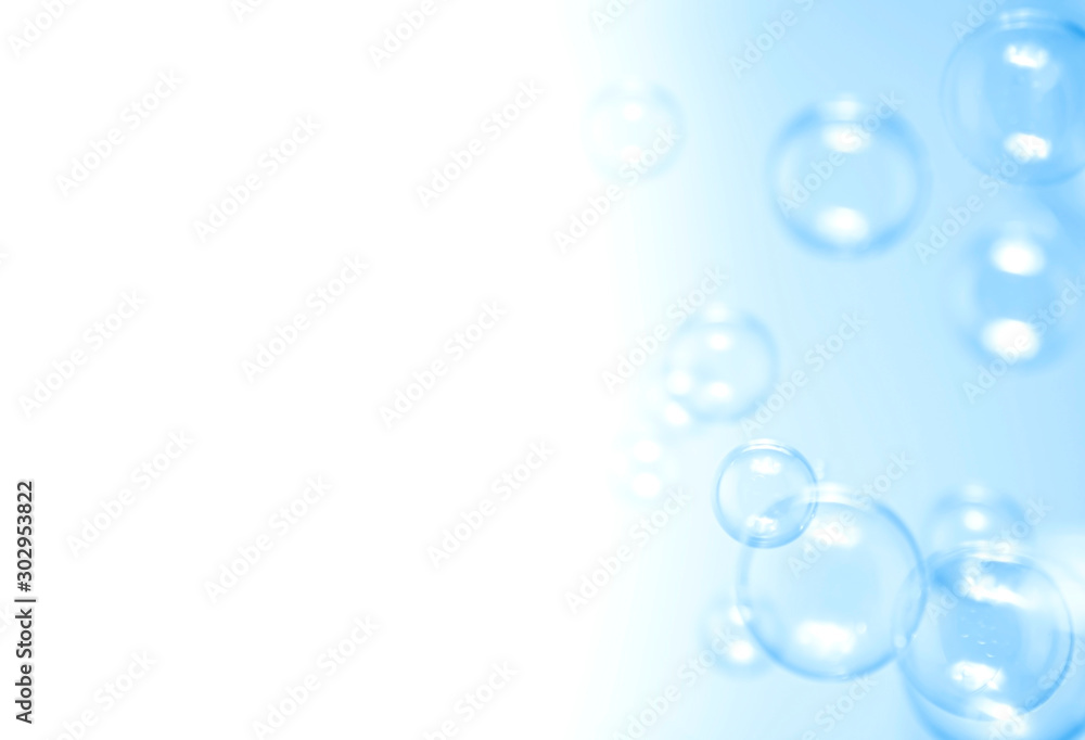 Blue soap bubbles on a withe background with copy space. Blue soap bubbles on a withe background with copy space.