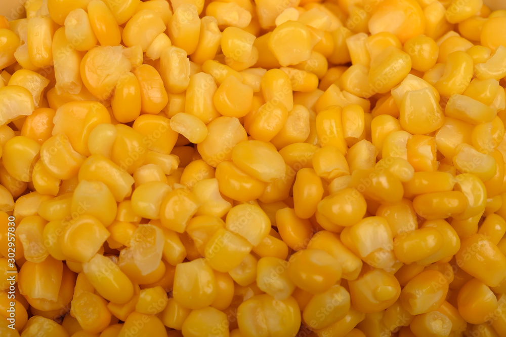 The texture of the grains of sweet corn. The pattern for the background. Fitness diet. Healthy diet. For a sweet treat. Close up. The texture of the grains of sweet corn. The pattern for the background. Fitness diet. Healthy diet. For a sweet treat. Close up.