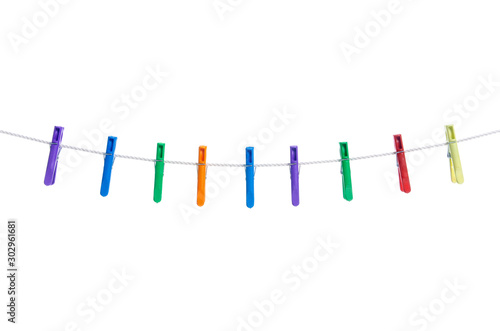 Color clothespins rope on white background isolation