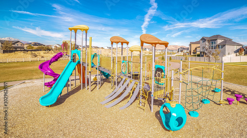 Panorama Brightly colored blue and purple play equipment