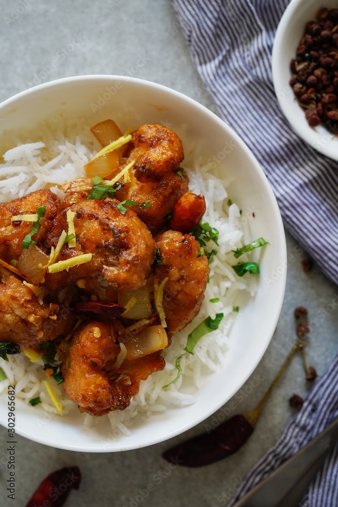 Kung Pao Cauliflower and rice/ Gobi Manchurian, selective focus Kung Pao Cauliflower and rice/ Gobi Manchurian, selective focus