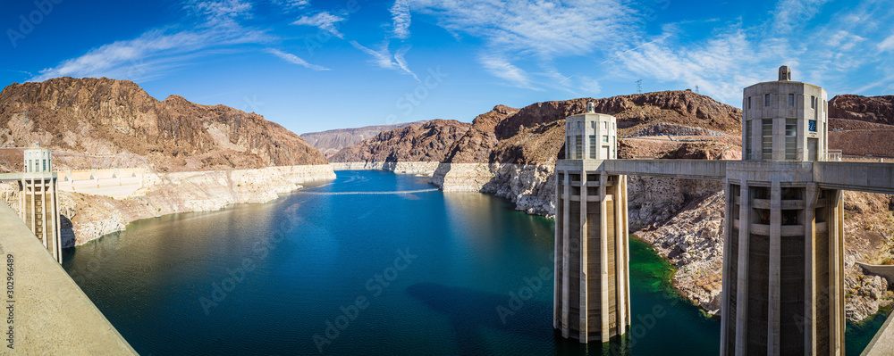 Panorama image looking into Lake Meade from the Hoover dam with the bleached high waterline of the dam.