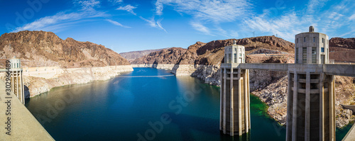 Panorama image looking into Lake Meade from the Hoover dam with the bleached high waterline of the dam. photo