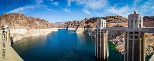 Panorama image looking into Lake Meade from the Hoover dam with the bleached high waterline of the dam.