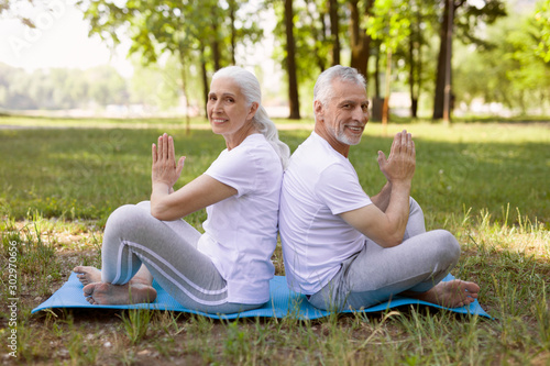 Friendly couple doing meditation together stock photo © Afshar Tetyana