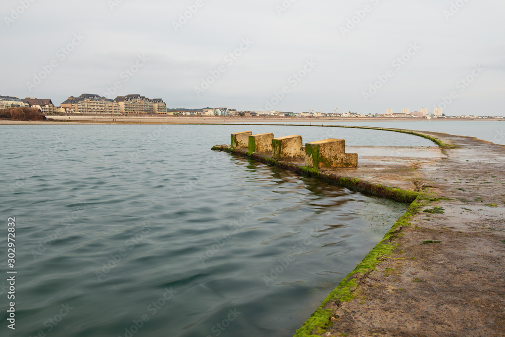 Concrete start blocks in the Havre des Pas seawater swimming pool