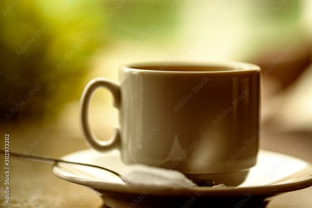 Cup of coffee in a cafe. Photographed close-up. Cup of coffee in a cafe. Photographed close-up.