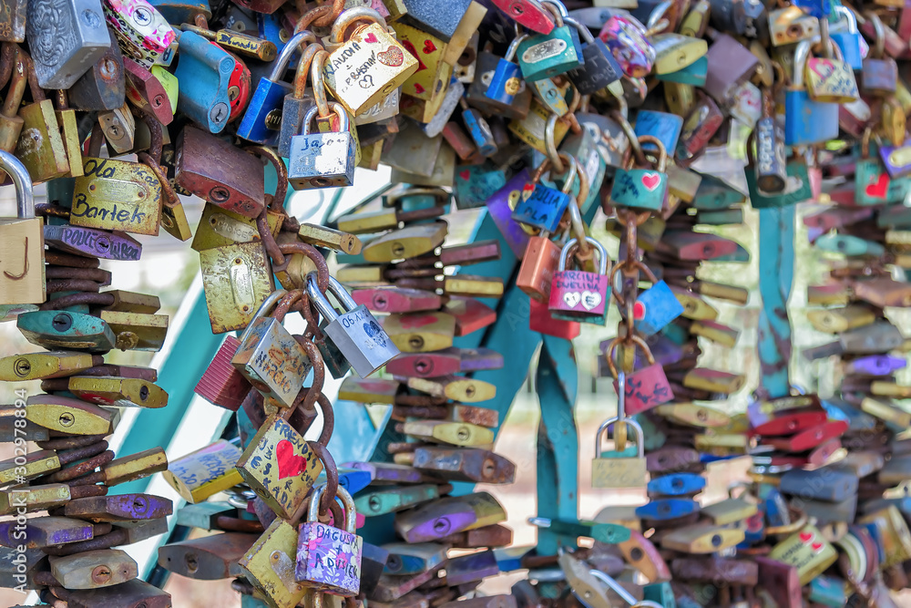 Obraz premium Love Padlocks - Locks of Love - Lovepoint for Sweethearts - in Wrozlaw, Poland, close up