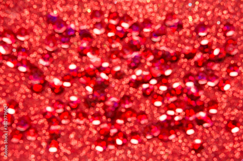 Abstract festive background .Christmas and New Year holidays glitter bokeh  glitter  bluer. Red color.