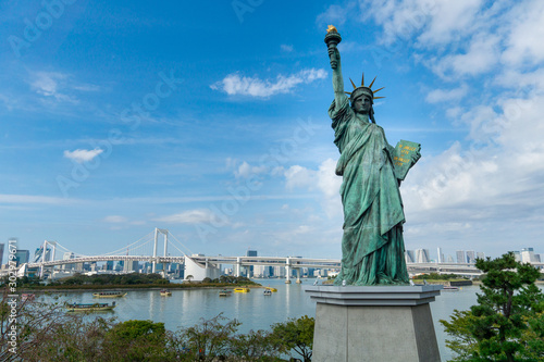 Statue of liberty and rainbow bridge in Tokyo  Japan