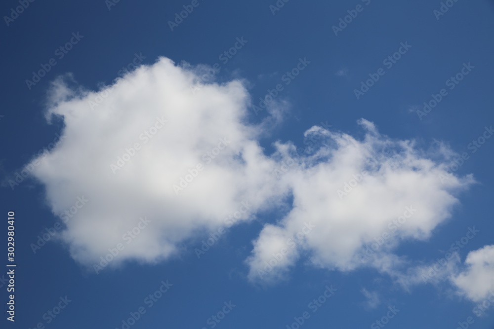 blue sky with cloud closeup . Blue sky and clouds background material. Blue sky with white clouds. blue sky with cloud closeup . Blue sky and clouds background material. Blue sky with white clouds.