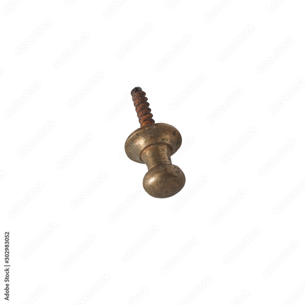 The antique copper furniture screw on a white background The antique copper furniture screw on a white background