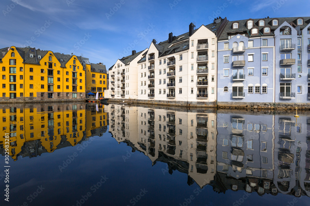 Obraz Colorful architecture of Alesund reflected in the water, Norway