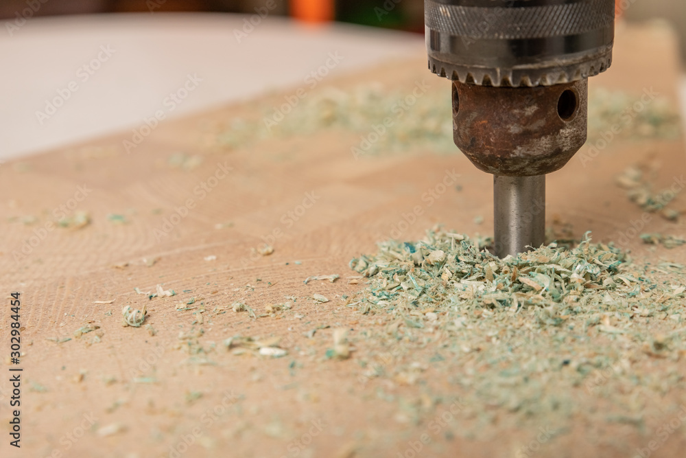 drilling holes in the table top of chipboard (particle Board) drilling holes in the table top of chipboard (particle Board)