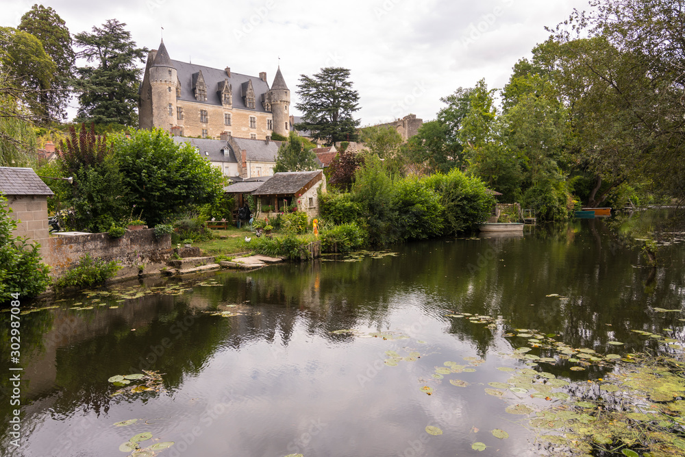 The beautiful village of Montresor bathed by the Indrois river, located in the Loire Valley.