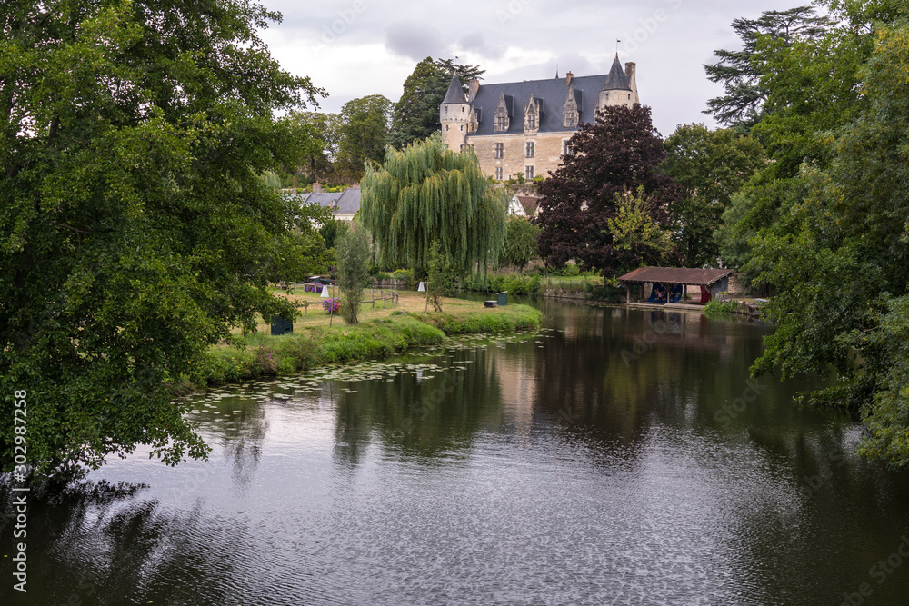 The beautiful village of Montresor bathed by the Indrois river, located in the Loire Valley. The beautiful village of Montresor bathed by the Indrois river, located in the Loire Valley.