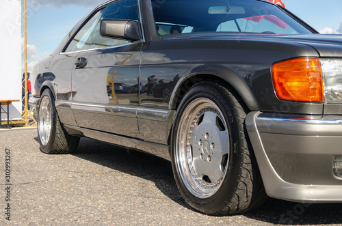 SUMY, UKRAINE - SEPTEMBER 21, 2019. Mercedes-Benz 560 SEC W126. AMG bumpers and sills. AMG wheels. S-class. Refurbished coupe in perfect condition
