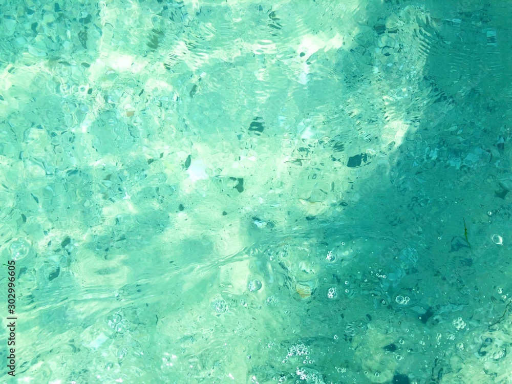 Clear sea water on the beach.
