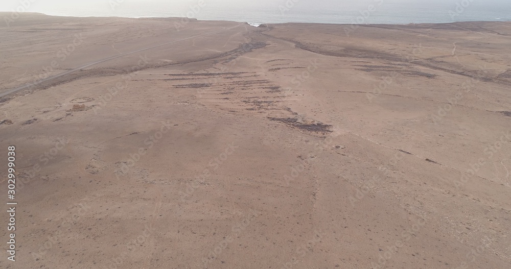 Fototapeta premium Sunnset between mountains,cliffs and desert landscape