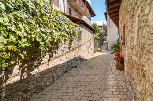 Narrow street of mountain ancient village Zelbio, Italy © EleSi