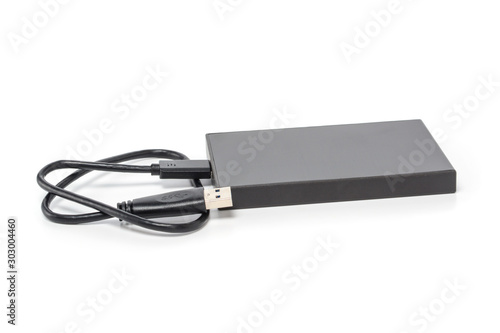 External hard drive disc with usb 3.0 cable. Best way of data storage on portable hdd. Close up, isolated on white background, full depth of field.