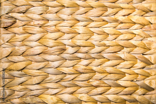 Napkin woven into a beautiful pattern of sea hyacinth yellow brown. Backgrounds, design, structures.