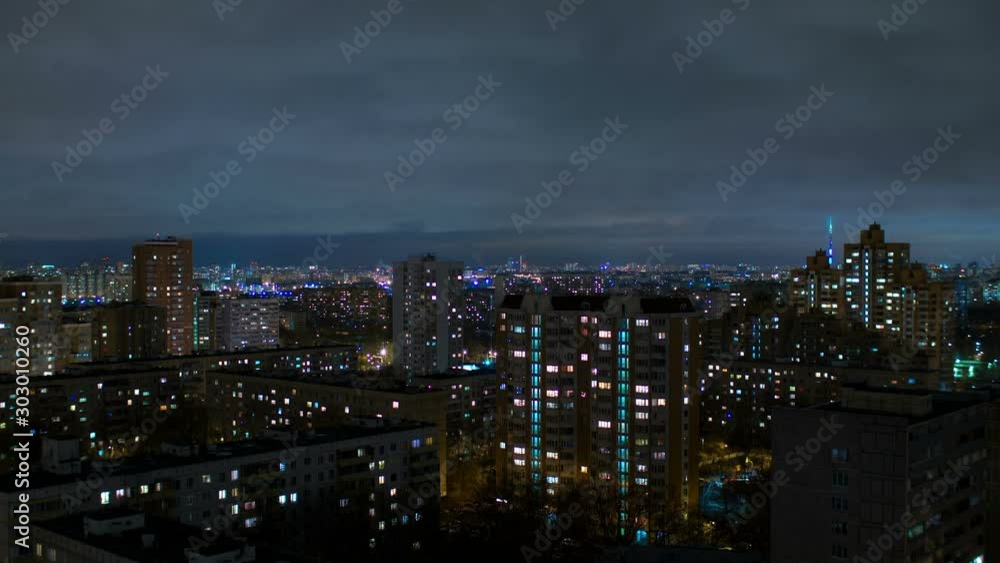 Moving cloudscape over the city at night, time lapse Moving cloudscape over the city at night, time lapse