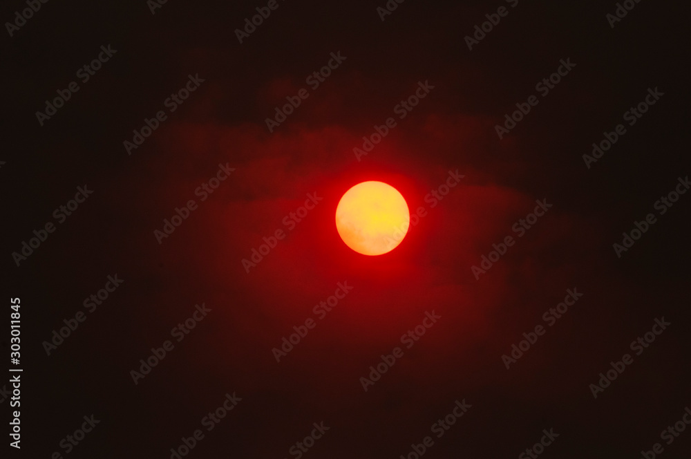 Gosford, Central Coast, NSW, Australia. 5:23 pm. Saturday 15th November. Sunset over the city through bushfire smoke haze. Gosford, Central Coast, NSW, Australia. 5:23 pm. Saturday 15th November. Sunset over the city through bushfire smoke haze.