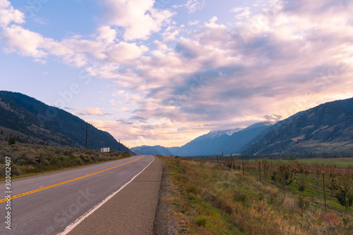 Crowsnest Highway running through Similkameen Valley in autumn at sunset with view of Snowy Mountain